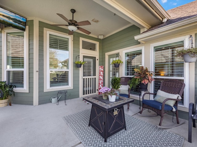 view of patio featuring ceiling fan