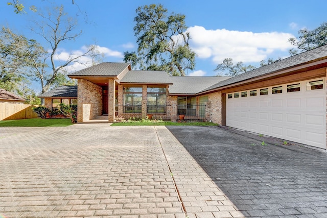 view of front of property with a garage