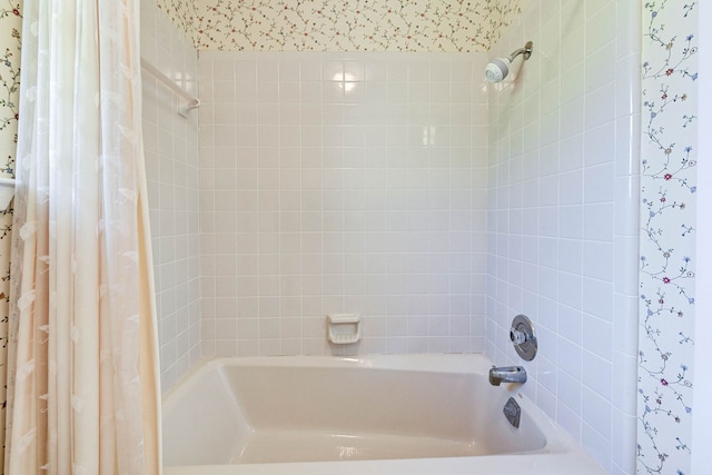 bathroom with shower / bath combo