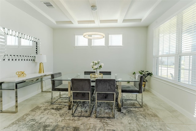 dining area with coffered ceiling, beamed ceiling, and light tile patterned floors