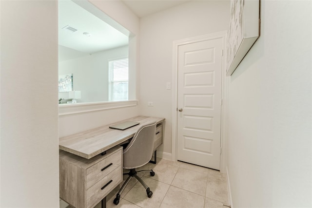 office space featuring light tile patterned floors