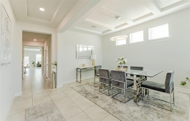 dining room featuring light tile patterned flooring, beam ceiling, and coffered ceiling