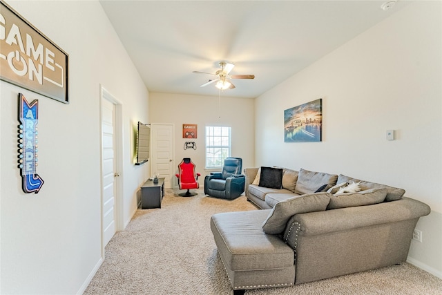 living room featuring ceiling fan and carpet flooring