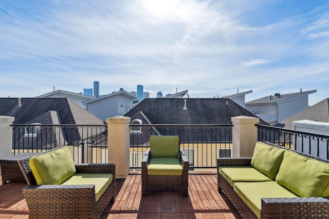 wooden deck featuring an outdoor hangout area