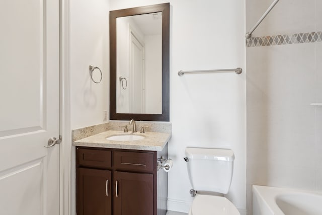 full bathroom with vanity, toilet, and washtub / shower combination