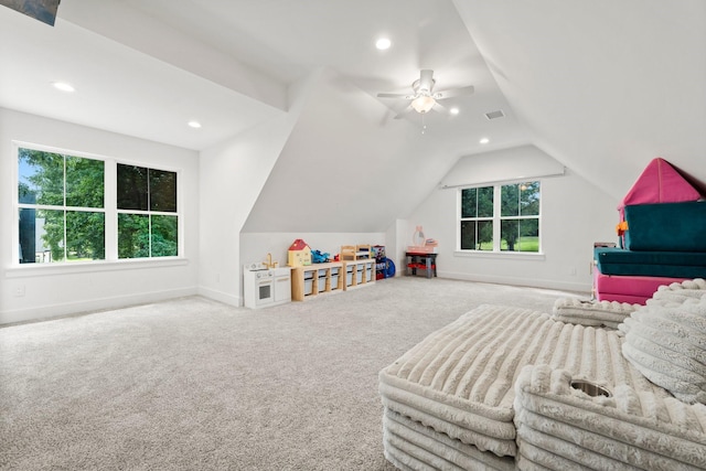 bedroom with ceiling fan, carpet, and vaulted ceiling