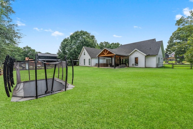 view of yard featuring a trampoline