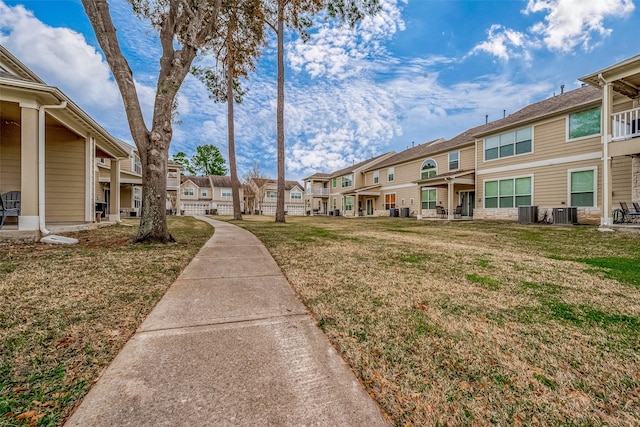 view of community featuring a yard