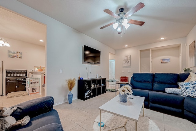 tiled living room featuring ceiling fan