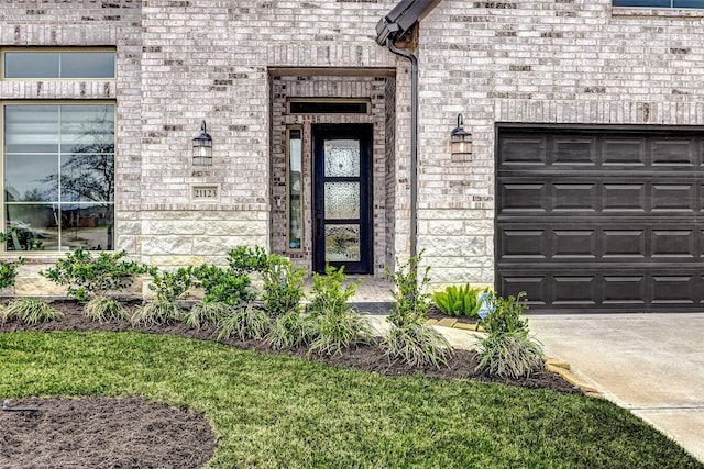 property entrance with a garage