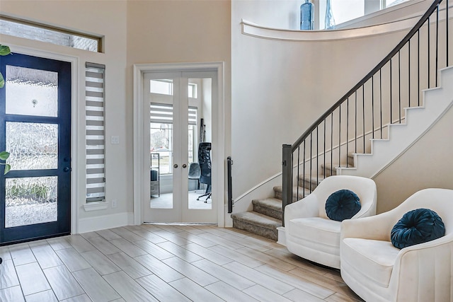 entryway featuring french doors