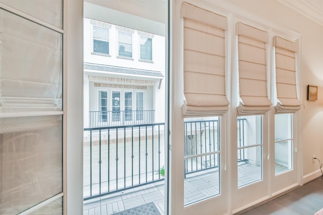 interior space with crown molding