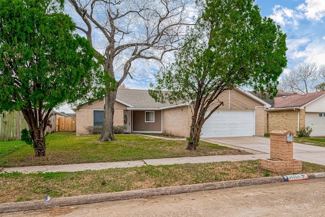 ranch-style house featuring a garage and a front lawn