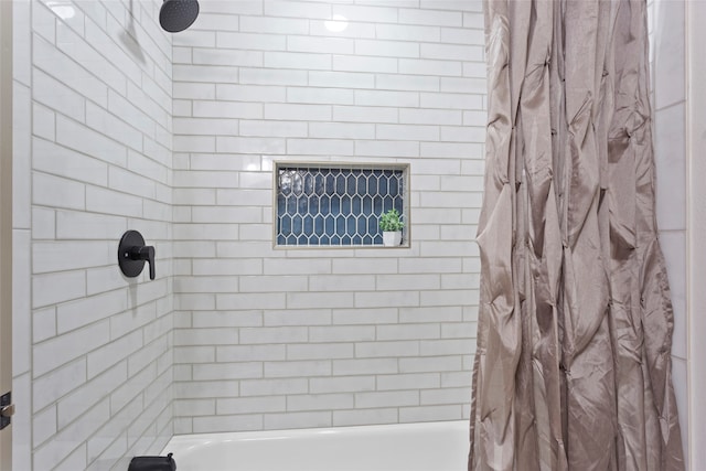 bathroom featuring shower / bath combination with curtain