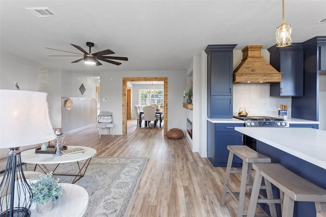 interior space featuring light hardwood / wood-style floors and ceiling fan