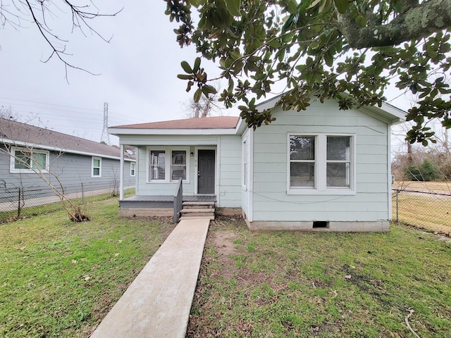 view of front of property with a porch and a front yard