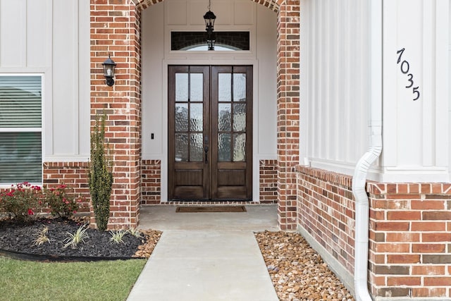 entrance to property featuring french doors