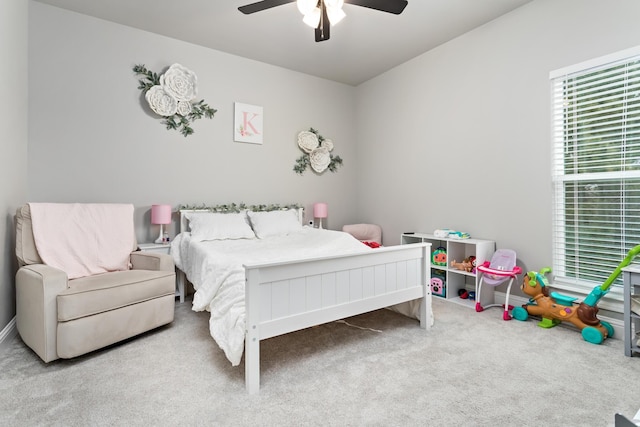 bedroom featuring ceiling fan and carpet floors