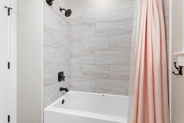 bathroom featuring shower / bath combo with shower curtain