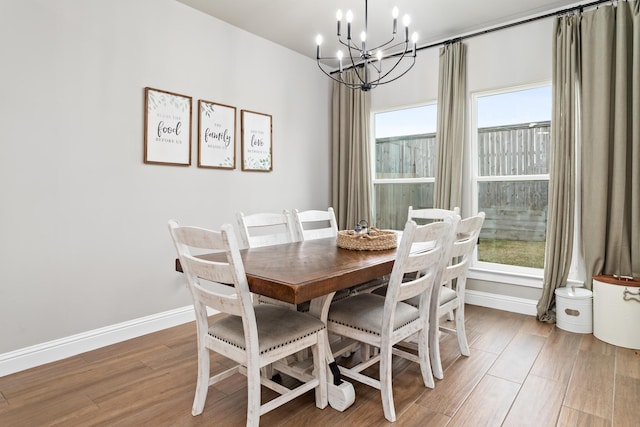 dining room featuring a notable chandelier