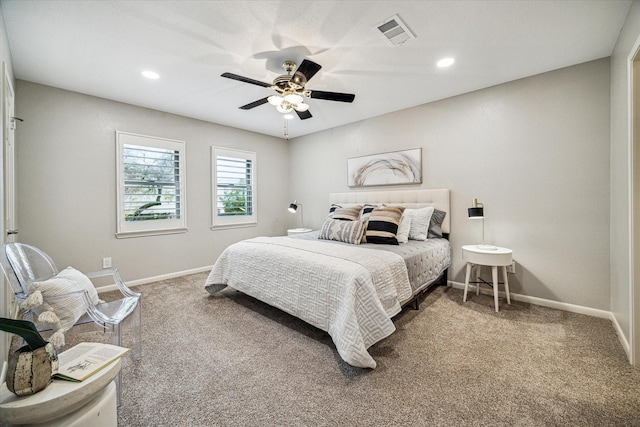 bedroom featuring a ceiling fan, carpet flooring, visible vents, and baseboards