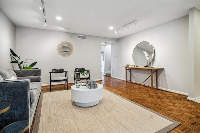 living room with parquet floors