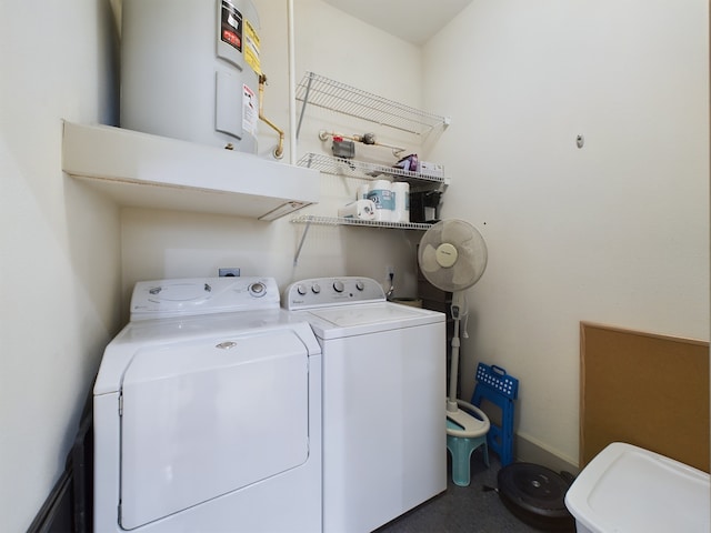 clothes washing area featuring washer and dryer