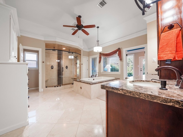 bathroom featuring ceiling fan, vanity, ornamental molding, and separate shower and tub