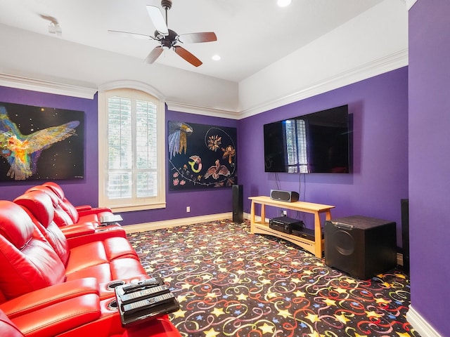 cinema with carpet flooring and ceiling fan