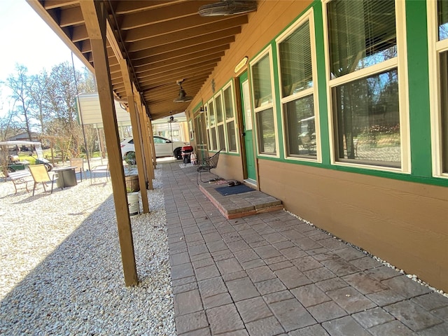 view of patio / terrace featuring ceiling fan