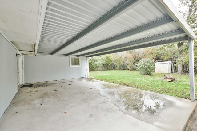 garage featuring a yard