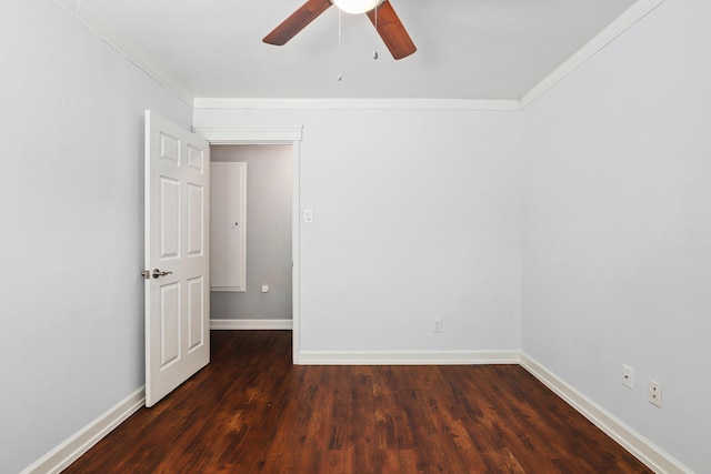 unfurnished room with ceiling fan, ornamental molding, and dark hardwood / wood-style flooring