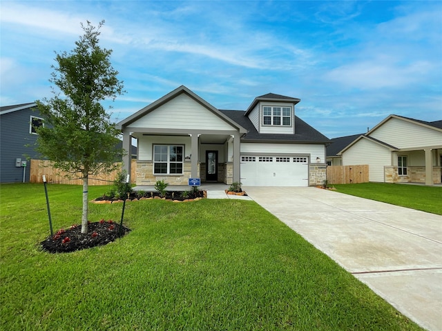 craftsman-style home with a front lawn and a porch