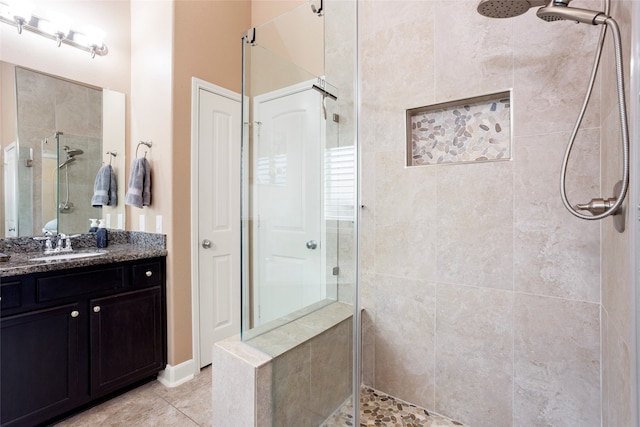 bathroom featuring vanity and walk in shower