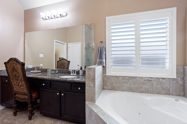 bathroom featuring plus walk in shower and vanity