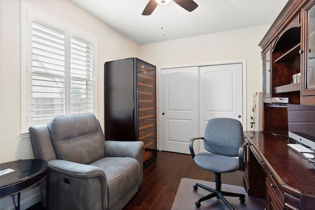 office space with ceiling fan and dark hardwood / wood-style flooring