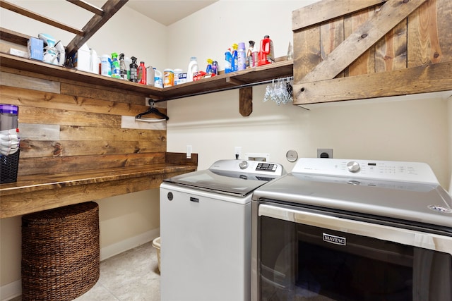 laundry room featuring independent washer and dryer