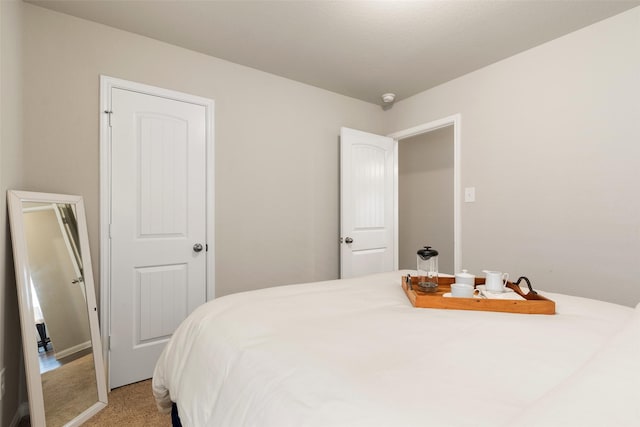 bedroom featuring carpet flooring