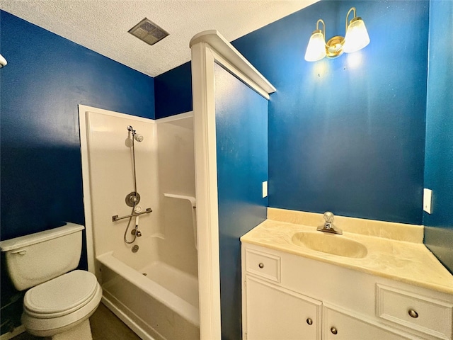 full bathroom with vanity,  shower combination, toilet, and a textured ceiling