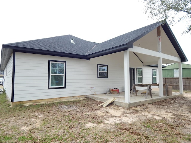 back of property with a patio area