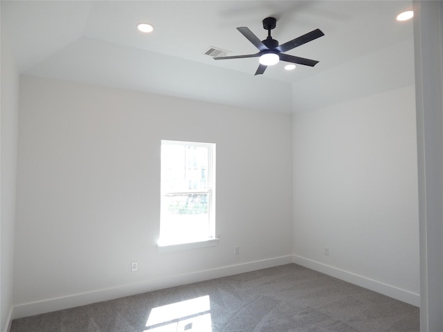 empty room with carpet floors, recessed lighting, visible vents, and baseboards