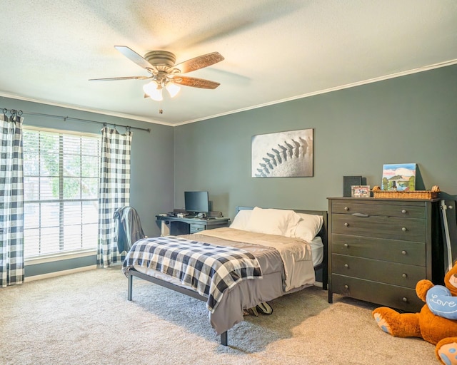 carpeted bedroom featuring crown molding, a textured ceiling, and ceiling fan