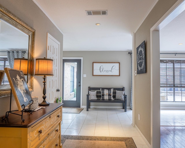 hall featuring light tile patterned flooring