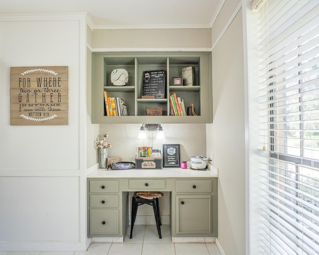 tiled office featuring built in desk and ornamental molding