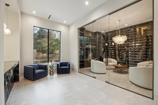 wine area with an inviting chandelier