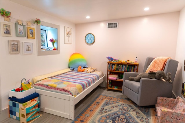 bedroom featuring dark wood-type flooring