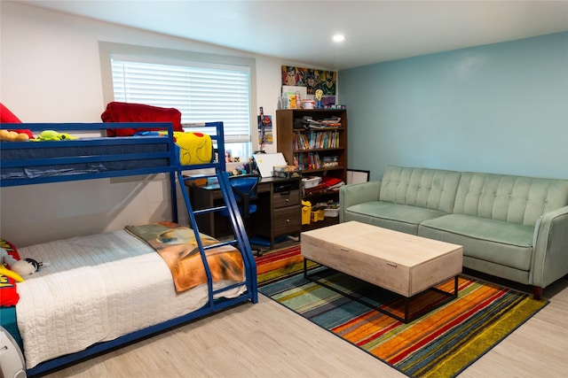 bedroom with light wood-type flooring