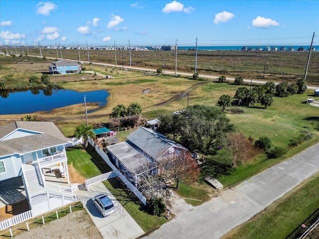 bird's eye view with a water view and a rural view