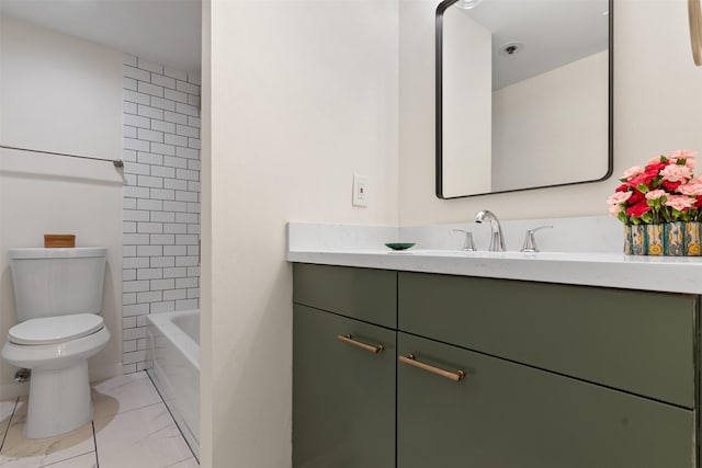 full bathroom featuring tiled shower / bath combo, toilet, tile patterned floors, and vanity