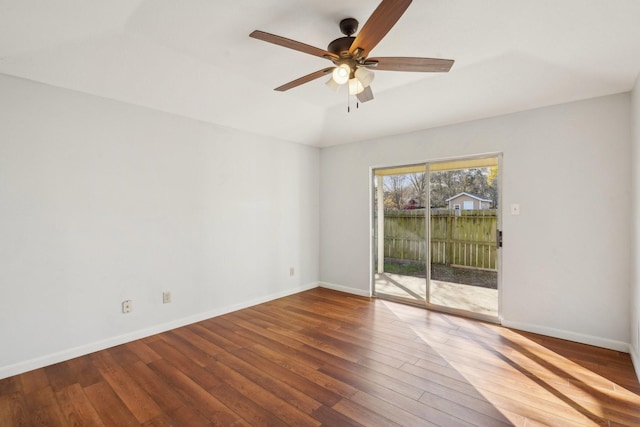 unfurnished room with hardwood / wood-style flooring and ceiling fan